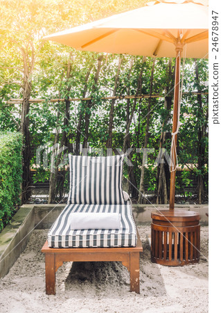Umbrella and chair Umbrella and chair 24678947