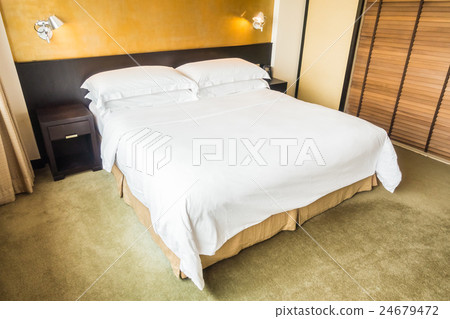 White pillow on bed 24679472
