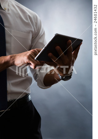 Men using tablets Men using tablets 24681432