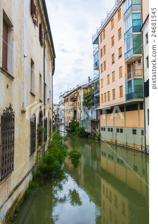 canal San Massimo runs among residential houses 24681545