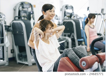 Women exercising at fitness gym 24685771