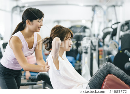 Women exercising at fitness gym 24685772