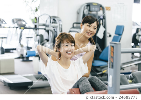 Women exercising at fitness gym 24685773