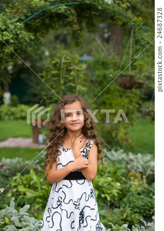 Little girl with long hair 24687328