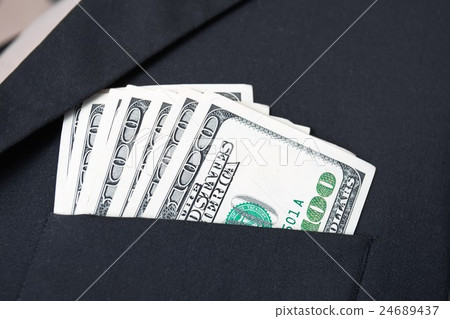 United States dollar in businessman suit pocket United States dollar in businessman suit pocket 24689437