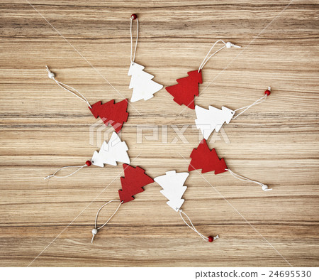 Red and white decorative christmas trees in circle 24695530