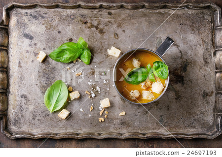 Bowl of carrot soup 24697193