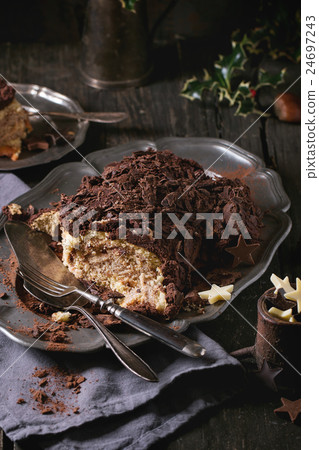 Sliced christmas chocolate yule log 24697243