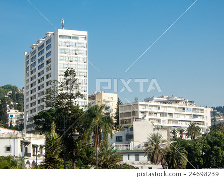 Buildings of white walls standing on the hill Buildings of white walls standing on the hill 24698239