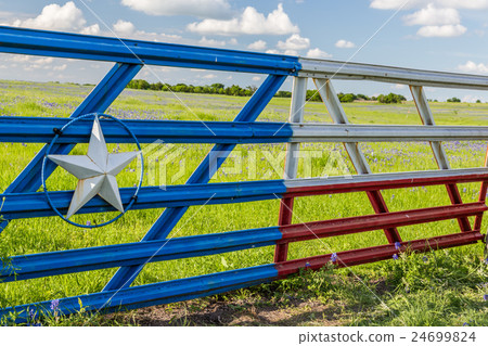 Texas flag gate in Ennis countryside. 24699824