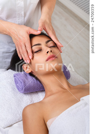 Woman beautician doctor make neck massage in spa Woman beautician doctor make neck massage in spa 24700359