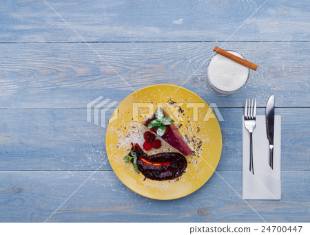 Restaurant dessert. Berry cheesecake with cream Restaurant dessert. Berry cheesecake with cream 24700447