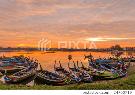 Wooden boat in Ubein Bridge at sunrise 24700719