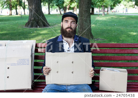 Vagrant with cardboard 24705438