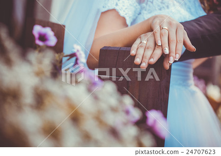 Bride and groom holding hands Bride and groom holding hands 24707623