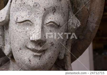 Close-ups statue the face Chinese Stone Doll. 24712715