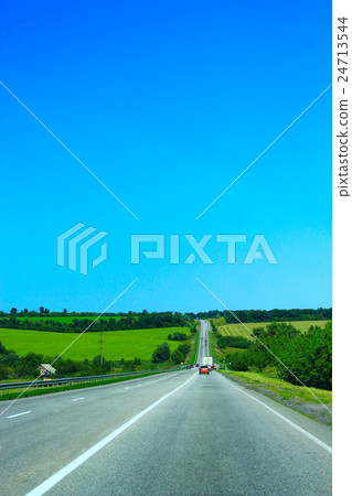 asphalted road and the blue sky asphalted road and the blue sky 24713544