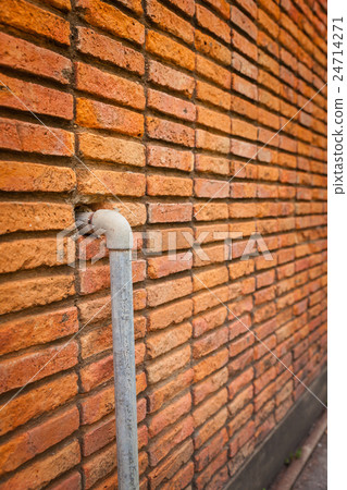 Brick wall with pipes background Brick wall with pipes background 24714271