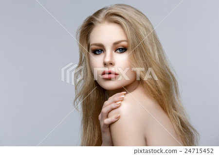 Beautiful girl with blond long hair and makeup 24715452