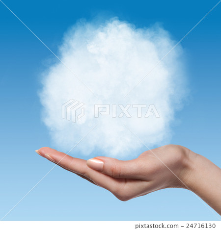 Cloud in woman hands on blue sky 24716130