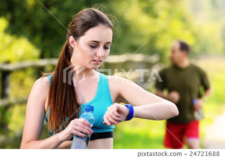 Couple running outdoors 24721688