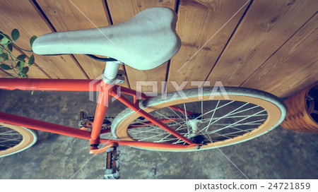fixed gear bicycle parked with wood wall 24721859