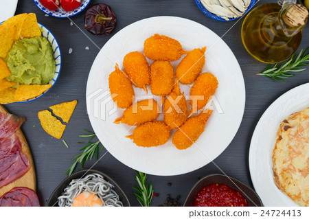 Table with spanish tapas Table with spanish tapas 24724413