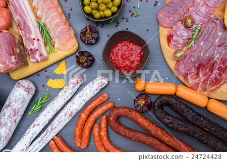 Picnic table with spanish sausage tapas Picnic table with spanish sausage tapas 24724428