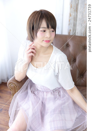 Young lady's hair style Young lady's hair style 24731739