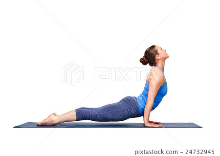 Sporty fit yogini woman practices yoga asana 24732945