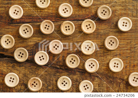 Collection of wooden buttons Collection of wooden buttons 24734206