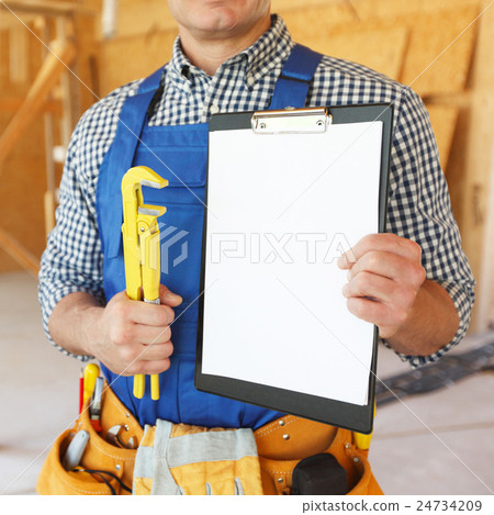 Workman with wrench Workman with wrench 24734209