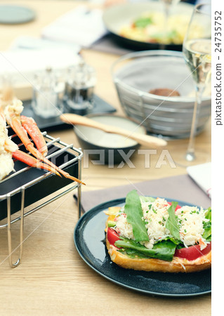Crab bruschetta in restaurant Crab bruschetta in restaurant 24735752