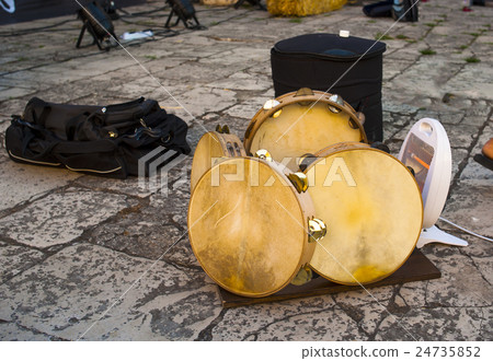 the skin of the tambourines of a folk band  24735852