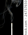 Ignition of a match, with smoke on dark background 24737650