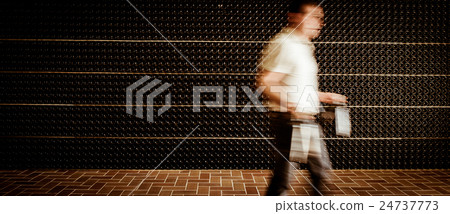 Winemaker in cellar holding in these hands red 24737773