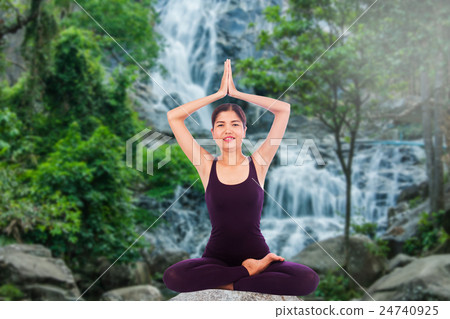 young woman practicing yoga young woman practicing yoga 24740925