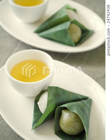 Tea (high angle) with bamboo dumpling Tea (high angle) with bamboo dumpling 24742436
