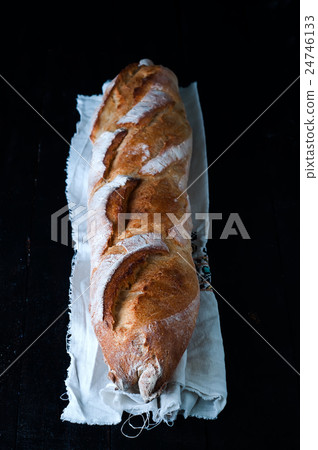 Baguette on black background. 24746133