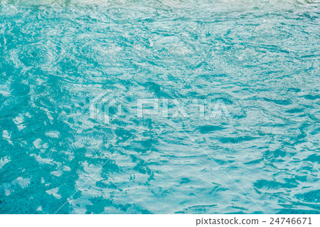 Blue swimming pool rippled water . Blue swimming pool rippled water . 24746671
