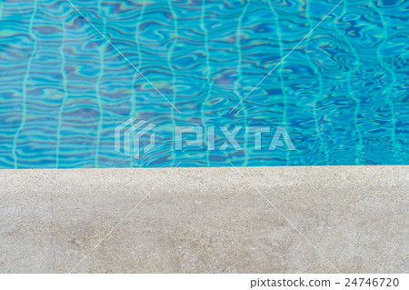Blue swimming pool rippled water . Blue swimming pool rippled water . 24746720