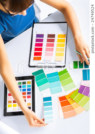 woman working with color samples for selection 24749524