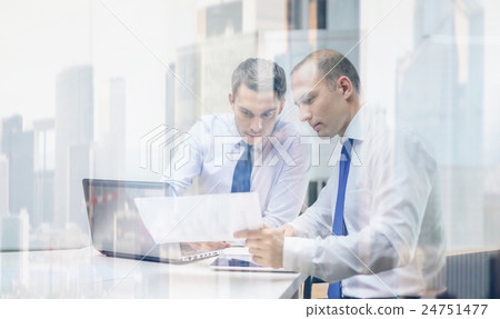 two businessmen having discussion in office two businessmen having discussion in office 24751477