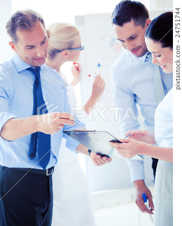 business team having discussion in office business team having discussion in office 24751744