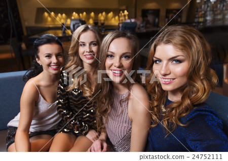 happy smiling women taking selfie at night club happy smiling women taking selfie at night club 24752111