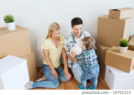 happy family moving to new home and playing ball happy family moving to new home and playing ball 24752123
