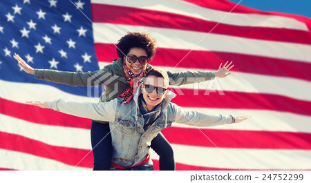 happy multiracial couple over american flag 24752299