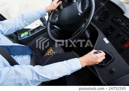 close up of driver driving passenger bus 24752595