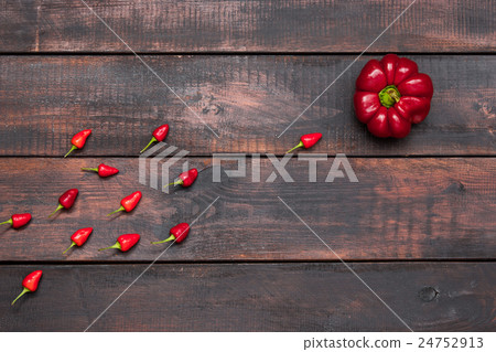 fresh bitter and sweet pepper on wooden table fresh bitter and sweet pepper on wooden table 24752913