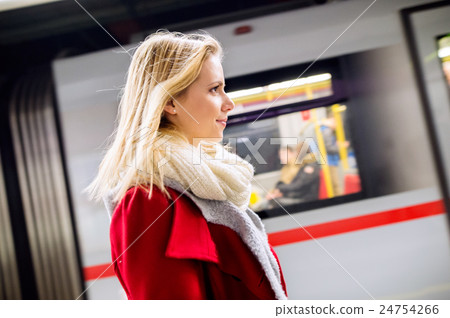 Beautiful young woman at the underground platform 24754266